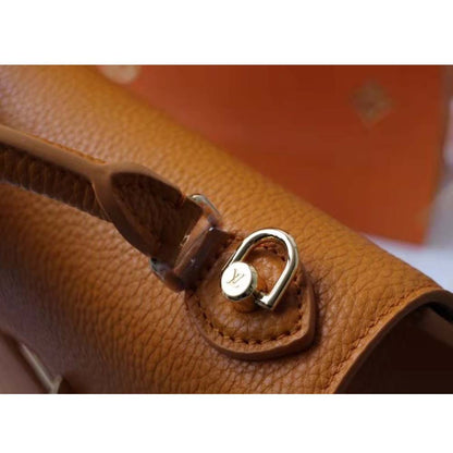 Louis Vuitton Women Twist One Handle PM Handbag in Taurillon Leather-Brown