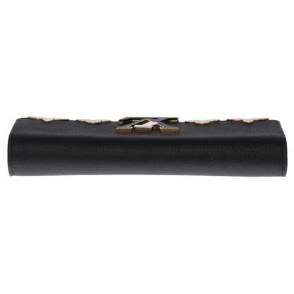 LOUIS VUITTON Brand New Capucines GM Wallet in black Taurillon leather