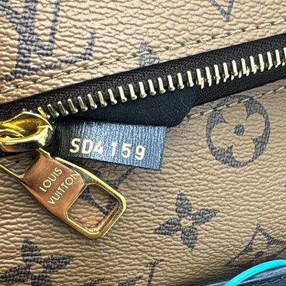 LOUIS VUITTON  Metis Pochette Reverse Monogram Canvas Crossbody Bag Brown