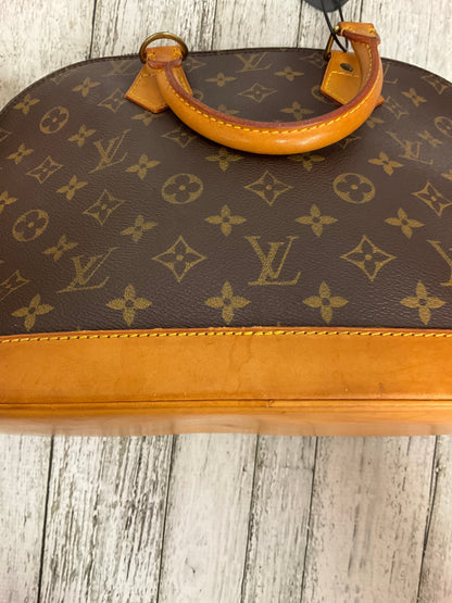 Handbag Designer By Louis Vuitton  Size: Medium