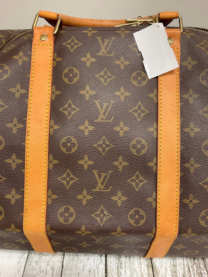 Duffle And Weekender Designer By Louis Vuitton  Size: Large