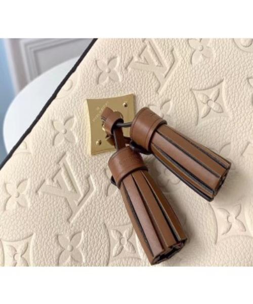 Louis Vuitton Saintonge Monogram Empreinte Leather Creme Caramel