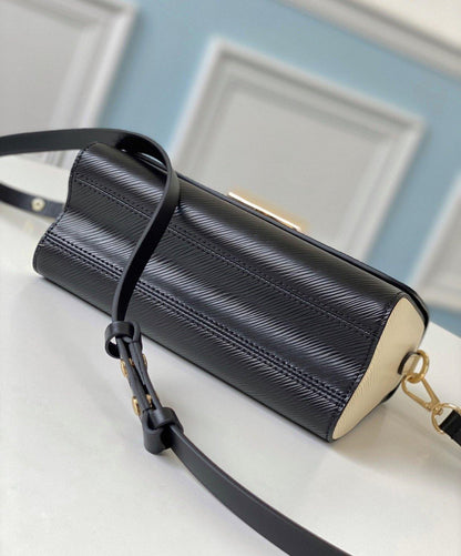 Louis Vuitton Crafty Twist MM Bag