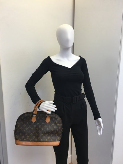 LOUIS VUITTON Alma Handbag in Brown Canvas