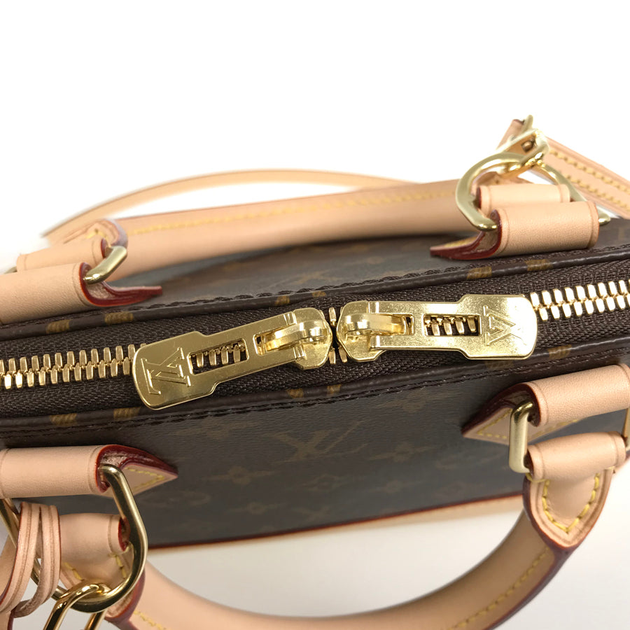 LOUIS VUITTON Monogram Alma BB Handbag